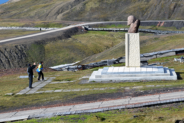 Tourists photograph Lenin’s monument in Barentsburg, Norway.